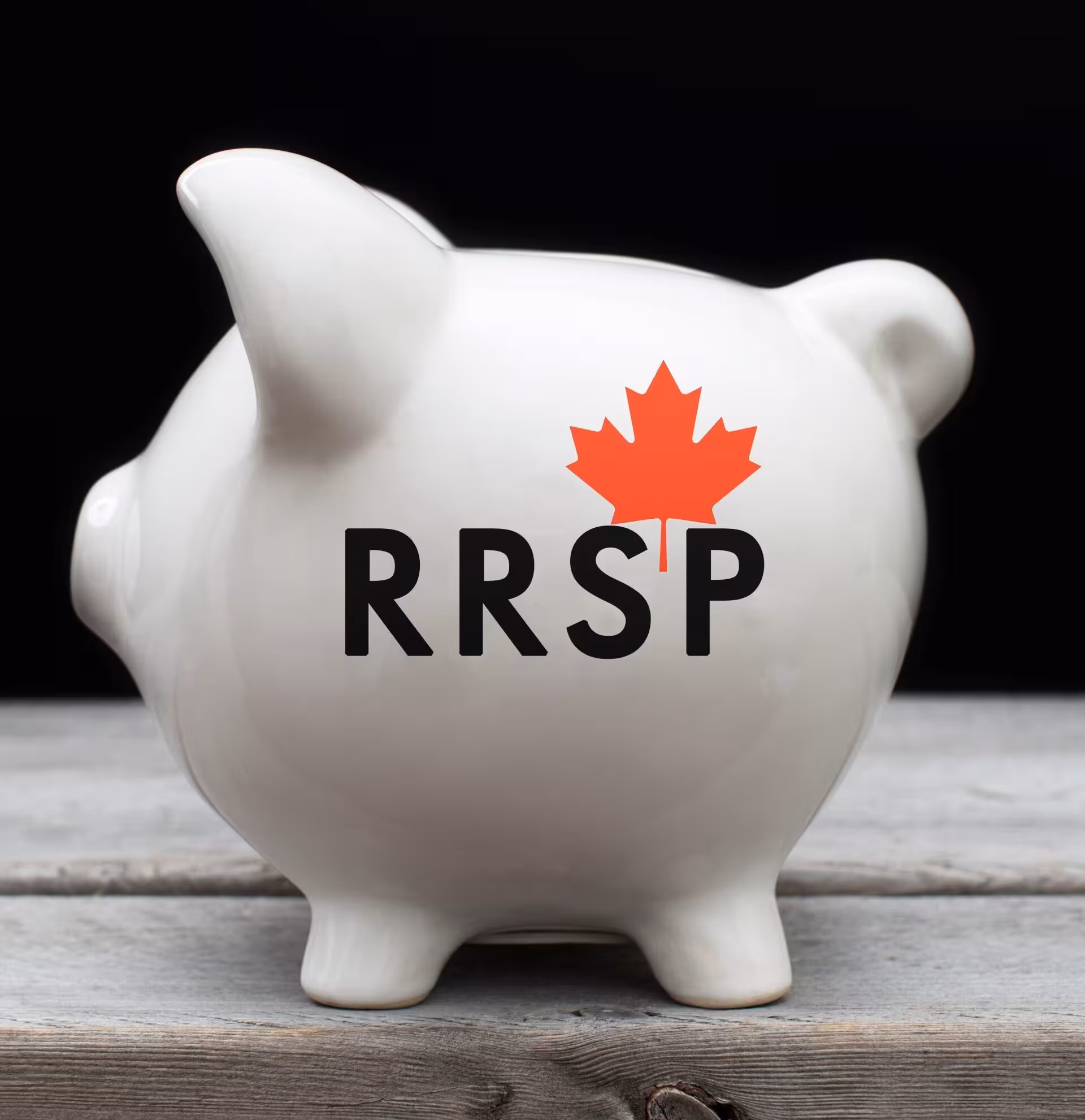 RRSP White Piggy Bank with red Canada flag on it